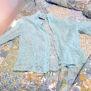 Lovely light blue top, perfect over camisole.